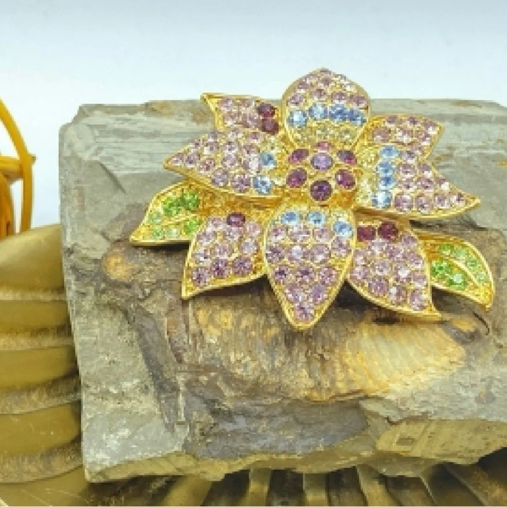 Elegant Gold Floral Brooch with Multicolor Crystals